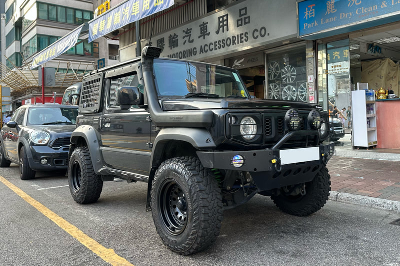 Suzuki Jimny and American Racing Outlaw 2 wheels and tyre shop hk and jb74